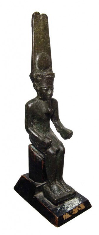 Egypt. Large bronze statue of the god Atum: A large bronze statue of the god Atum, Late Period, c. 664-343 BC, depicted seated, wearing a kilt and a tall headdress consisting of feathers and a solar disc and a false beard. A nice and very subst