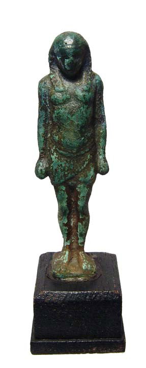 Rare Roman-Egypt bronze figure of a man: A rare Roman bronze figure of a man, c. 2nd-3rd Century AD, perhaps of Pharaoh. He wears a short kilt and tripartite headdress with lappets, hands suspended at his sides, feet together. Intact with th
