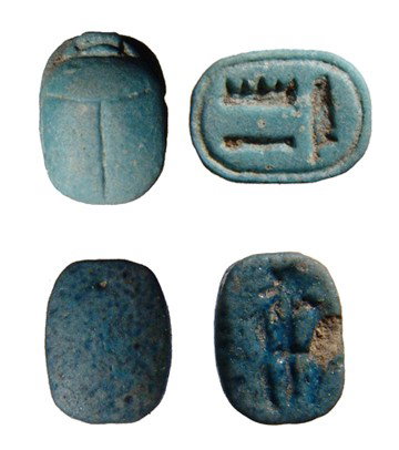Pair of blue faience scarabs. 19th century coll.: A pair of blue faience scarabs. The scarab dates from the New Kingdom, c. 1570-1075 BC, and is well molded with "Amen-Re" on the base, 10 x 8mm. The scaraboid is a bit later and is brilliant blue, the