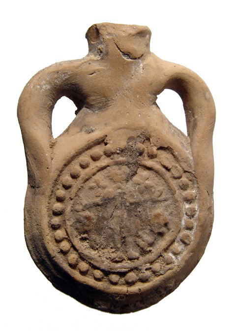 Terracotta souvenir pilgrim flask, Coptic Egypt: A terracotta souvenir pilgrim flask, Coptic Egypt, c. AD 480-650, depicting Saint Menas on one side, flanked by camels, his arms outstretched in blessing. Above each arm is a quincunx, representing a 