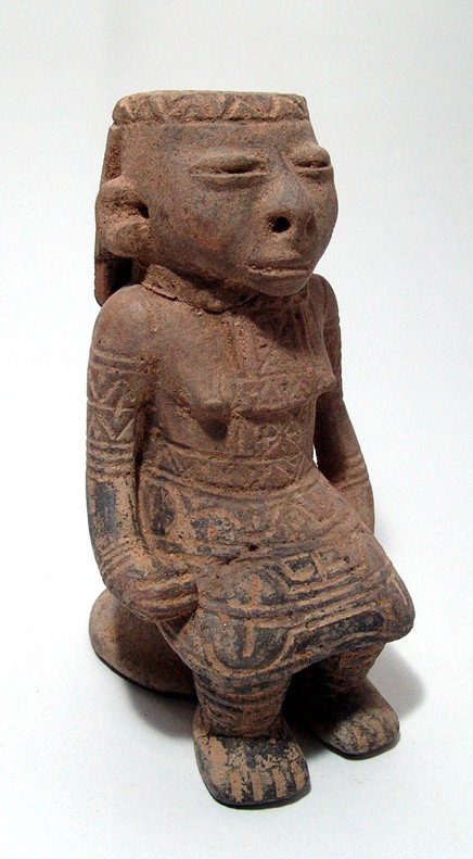 Sinu seated terracotta female figure, Colombia: A nice Sinu seated terracotta female figure, Colombia, c. AD 300-1550, headband, broad collar with large pectoral and a gown decorated with incised motifs. She sits on a spool-shaped seat, her face is