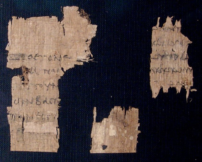 Framed set of Coptic papyrus fragments: A nicely framed set of papyrus fragments from a document written in Coptic, Roman Egypt, c. 3rd - 4th Century AD. Largest fragment measures 3 1/2" x 2 1/4" (6.1 x 5.7 cm), entire frame measures 8 1/2"