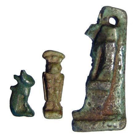 Three Late Period faience amulets, Egypt: A trio of Egyptian amulets, Late Period, c. 664 - 30 BC, including a nice bronze amulet of Bastet, a blue-green faience amulet of Thoth, and a green faience amulet of a feline-headed goddess. Minor ch