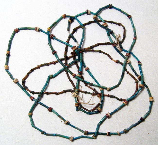 Lot of 3 Late Period faience necklaces: A lot of 3 faience necklaces, Late Period, c. 664 - 30 BC, each including multi-colored disk and tube beads. Longest measures about 30". Ex Maine private collection.