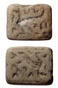 Syrian limestone seal, birds & pseudo-writing: Syria, c.3rd - 2nd Millennium BC. A rectangular limestone seal with large suspension hole running lengthwise. On either side is a bird amidst pseudo-writing. An old chip and a circular pattern on wear