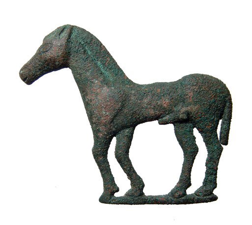 Bronze horse applique, Central Asia: A bronze applique in the form of a horse, Central Asia, c. 1st Millennium BC, the form realistically rendered. Intact, rectangular loop at the back. H: 2 3/4" (7.2 cm).Ex Sackler collection