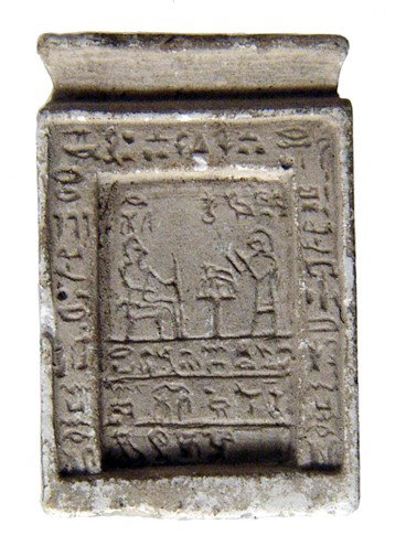 Choice limestone votive stele, Late Period: A choice limestone votive stele, Late Period, c. 664 - 343 BC, the central scene depicting Pharaoh seated with an attendant before him. Beautifully detailed with neatly incised hieroglyphic text in th