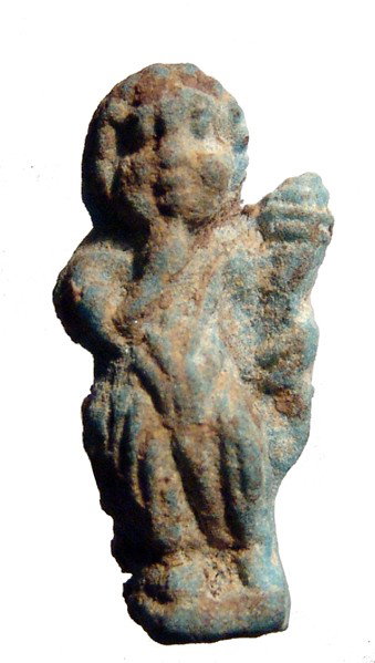 Choice Roman faience amulet of Harpokrates: A choice Roman faience amulet of Harpokrates, c. 2nd - 3rd Century AD, molded in the round, with finger to lip and holding a cornucopiae. Intact with light blue-green color, suspension loop at back. H