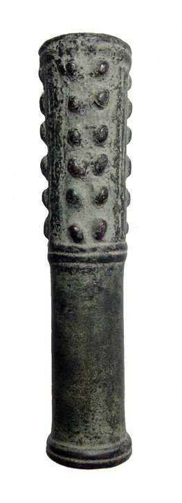 Luristan slender bronze mace-head, Persia: A nice Luristan slender bronze mace-head, Late 3rd - Early Millennium BC, the upper half with three vertical registers, each with domed bosses in two rows. The lower half is plain and the shaft holes 