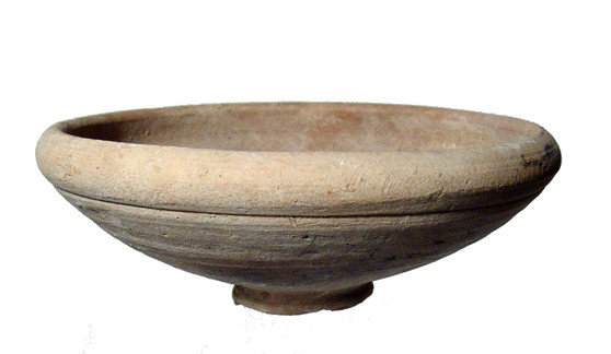 Nice Roman terracotta bowl, Holy Land: A nice Roman terracotta bowl, Holy Land, c. 1st Century AD, well thrown with tall ring foot and upward turned lip. Dia: 4 3/8" (11.1 cm). Intact with light earthen encrustation and antique graffito in