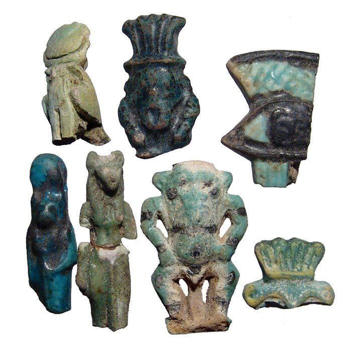 Egypt. Lot of 7 fragmentary amulets: A lot of 7 fragmentary amulets showing nice style and detail. Group includes several examples with nice color, style or detail. Noteworthy in the group is a 3rd Intermediate bicolor Bes amulet leopard