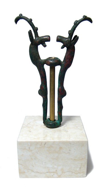 Persia. Luristan bronze finial with rampant goats: A nice Luristan bronze finial with rampant goats, Western Iran, early 1st Millennium BC, the vertical horns with prominent knobs along the front, their bodies slender and feet attaching to the upper a