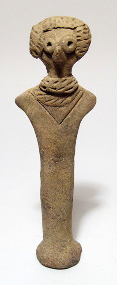 Syrio-Hittite terracotta Astarte figure: A Syrio-Hittite terracotta Astarte figure, Northern Syria, c. 2100 - 1600 BC, with characteristic bird-like features, incised headdress and broad collar. L: 6" (15.2 cm). Professionally restored break