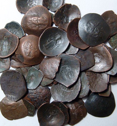 50 Byzantine bronze coins, Latin Crusaders: A group of 50 Byzantine bronze coins, struck during the 13th Centuries by the Latin Crusaders who occupied Constantinople after AD 1203. There are also a few earlier type of Manual, Alexius and other.