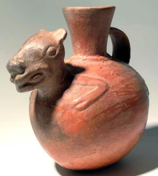 Chimu-Inca zoomorphic effigy vessel from Peru: A fine Chimu-Inca zoomorphic effigy vessel from Peru, c. AD 1300 - 1500, this nice orange-ware vessel depicting a finely detailed llama, the face nicely detailed, the legs are molded in relief and the