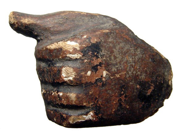 Egyptian wooden hand from a sarcophagus: A carved and painted wooden hand from a sarcophagus, Egypt, 3rd Intermediate Period, c. 1075 - 656 BC, with some minor scuffing and age deposits. Intact. W: 3 3/4" (9.5 cm). Southern California collec