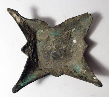 Roman bronze statue base: A Roman bronze statue base, c. 1st - 3rd Century AD, with a star-like appearance, one corner with bent with minor losses to tip. Basically encrusted as found. A most interesting piece! H: 2: (5.1