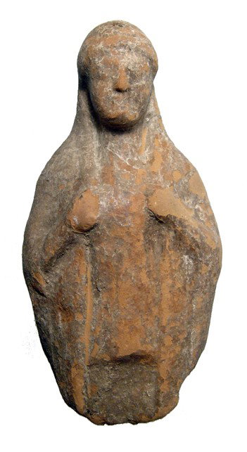 Attractive Greek terracotta torso of a woman: An attractive terracotta torso of a woman, Greek, c. 5th Century BC, wearing shallow diadem and clasping her cloak with both hands. H: 4 3/8" (11.1 cm). Light earthen deposits. Ex English private coll