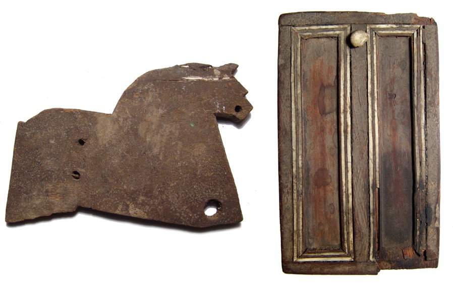 Pair of very interesting Egyptian wooden items: A pair of very interesting Egyptian wooden items. The first is a lid from a game or cosmetic box inlaid with ivory with a small knob handle, New Kingdom, c. 1570 - 1075 BC, the underside with one of t