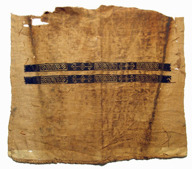 Coptic textile panel with embroidered strips: A Coptic textile panel with embroidered strips, Egypt, c. 4th Century AD. The fabric, linen and wool, with two long strips containing rectangular panels with geometric devices, all in dark brown. One 