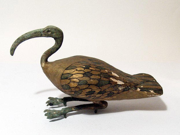 Nice Egyptian Ibis figure, early 20th Century: A very nice Egyptian Ibis figure, early 20th Century, the body plastered wood and painted, the wings and tail detailed. The legs, head and neck are of bronze, with naturalistic details and even patina