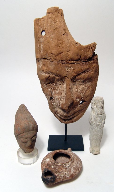Lot of 4 ancient objects including wood mask: A lot of 4 various ancient objects. The first is an Egyptian wood 'ka' mask, 3rd Intermediate Period, c. 1075 - 664 BC, from a child's sarcophagus, the facial features details and retaining part of th