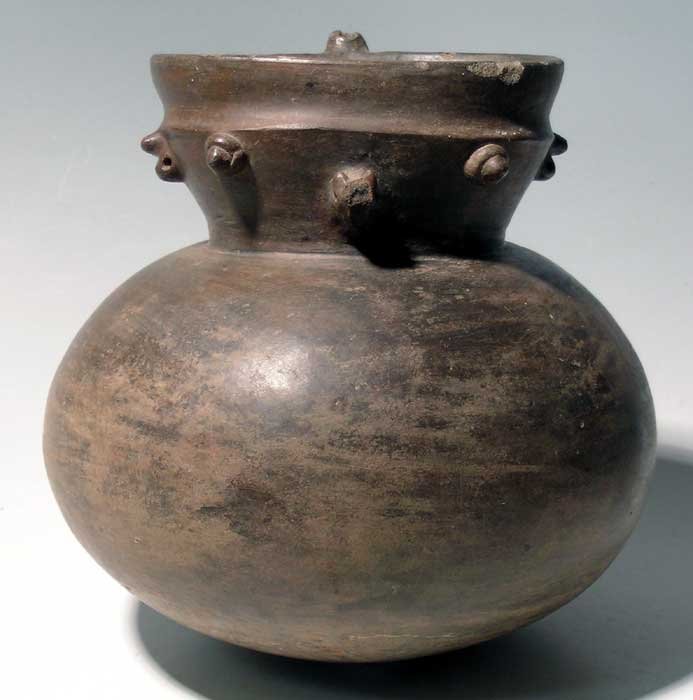 Large Tairona filtro vessel from Colombia: A large Tairona filtro vessel from Colombia, c. AD 1000 - 1500. This fine figural example is 8" high, 8" in diameter and is decorated with a zoomorphic creature. The thin pouring spout at the back of 