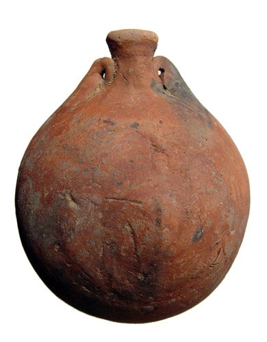 Attractive Egyptian red-ware flask, Dynasty 22-24: An attractive Egyptian red-ware flask, 3rd Intermediate, Dynasty 22-24, c. 945 - 712 BC, with lentoid body and small spout flanked by two handles. H: 4 1/8" (10.5 cm). Intact. Cf. A. Kelley, The Potte