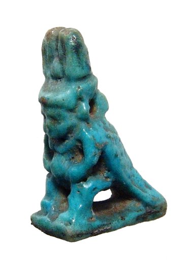 Choice Egyptian "power' amulet: A choice Egyptian "power' amulet, Late Period, c. 664 - 30 BC, a combination of the god Pataikos and the Horus falcon, he wears the disk and plumes heads, his hands to either side of his belly. On the