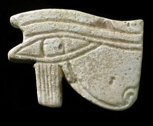 Egyptian faience Eye of Horus amulet: An Egyptian light blue faience Eye of Horus amulet, Late Period, c. 664 - 30 BC, with detail on both sides, L: 32mm, Thickness: 7mm. Ex Hamdy Sakr collection, London, acquired in the 1960's - 1970's.