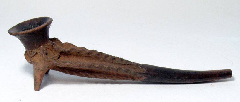 A Choice Michoacan Phytomorphic Pipe: Pre-Columbian. A beautiful Michoacan phytomorphic pipe, Mexico, c. 200 BC - AD 200, the base of the bowl shaped like an organ cactus. A wonderful example made from deep red-brown burnished clay with a
