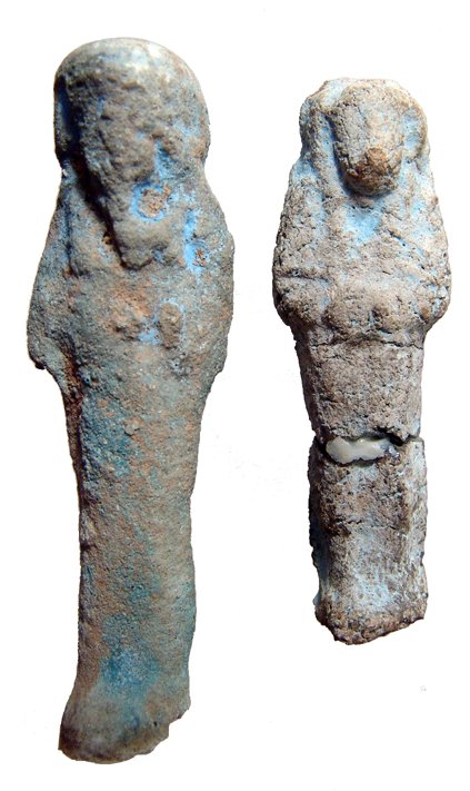 2 Late Period blue faience ushabtis: A pair of pale blue faience ushabtis, Late Period, c. 664 - 30 BC, rather crudely made with some remaining blue glaze. The larger with chipping to the bottom of the feet, the smaller with repairs. L: