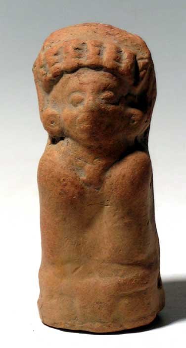 Attractive Maya rattle figure from Guatemala: An attractive Maya rattle figure from Guatemala, c. AD 400 - 800, the individual is depicted wearing a complex headdress, ear ornaments and necklace. H: 4 3/8" (11.1 cm). Good mineral deposits and roo