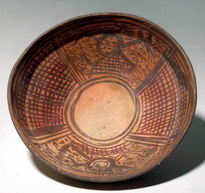 Fantastic Cajamarca bowl from northern Peru: Pre Columbian. A fantastic Cajamarca bowl from northern Peru, c. AD 200 - 800. This delicate footed pedestal bowl is made from orange-tinted kaolin, the interior is decorated with complex designs comb