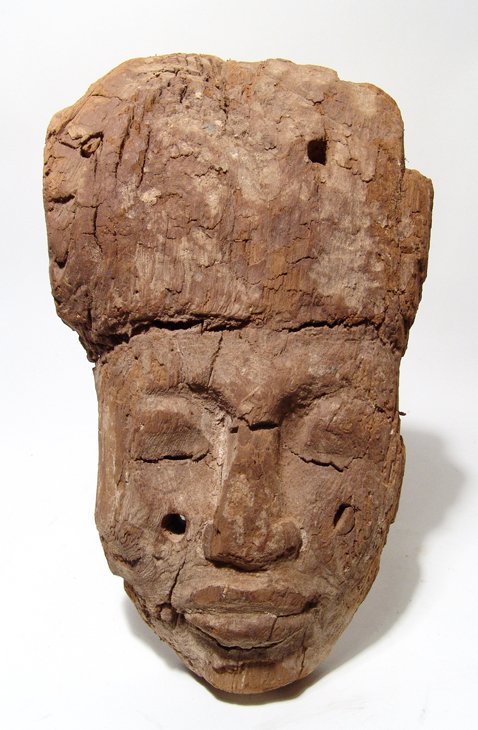 Nice Egyptian wood mummy 'mask': An Egyptian wood mummy 'mask', Late Period, c. 64 - 332 BC. From an anthropoid sarcophagus, the face originally nicely carved with large lips and eyes, the front part of the headdress remaining. H: 9 