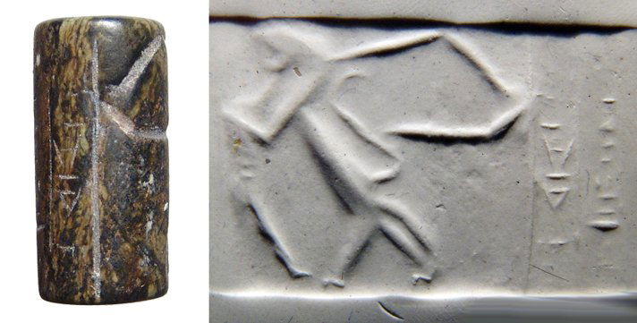 Akkadian cylinder seal, ex-Banks collection: An Akkadian green & black serpentine cylinder seal, c. 2334 - 2154 BC, with two columns of text, the rest of the seal appears to be either unfinished and then worked on at a later time or was left unf