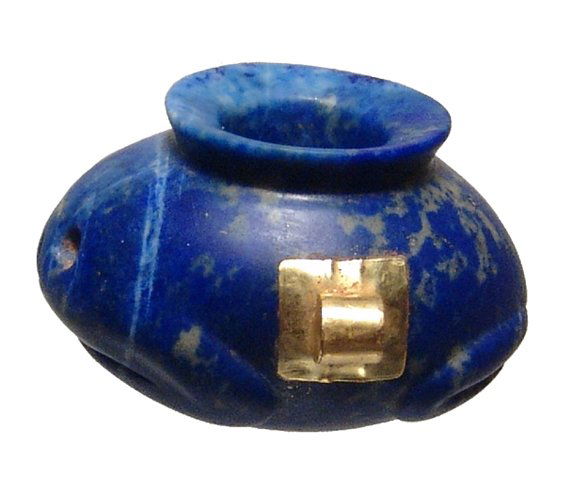 Lapis Lazuli lug-handled jar in the form of a frog: Possibly ancient or true Grand Tour. A beautifully carved gold and Lapis Lazuli lug-handled jar in the form of a frog, Early Egyptian style, the head, front and back legs naturalistically rendered, fl