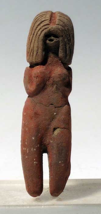 Fine Valdivia Venus figure from Ecuador: A fine Valdivia Venus figure from Ecuador, c. 3000 - 1200 BC. She is 3-1/8" high and is depicted holding her breasts. She was ritually broken in antiquity and has been glued without restoration. Her c