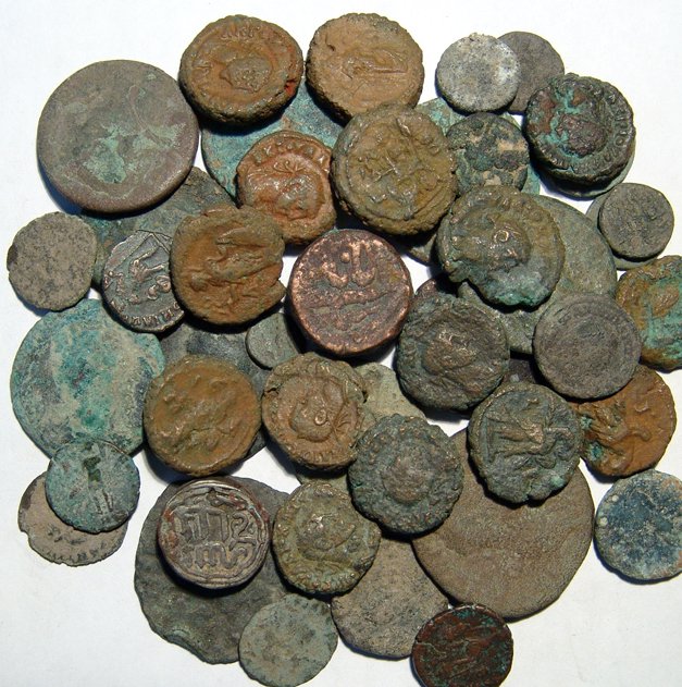 Lot of 44 ancient bronze coins: A lot of 44 ancient bronze coins. Lot includes mostly Roman imperial bronzes and potin tetradrachms from Alexandria, Egypt, and two Islamic coins, one silver. Largest 31mm in diameter. Ex Royal Athena