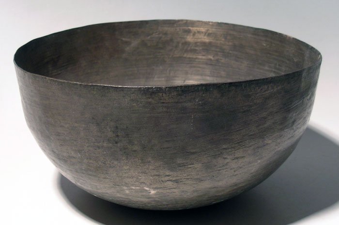 Buddhist incantation bowl from the Indus Valley: A lovely Buddhist incantation bowl from the Indus Valley, Taxila Period, c. 1st - 2nd century AD. This deep silver-bronze alloy (Villon) bowl is 8-3/4" in diameter, 4-1/2" deep and is decorated with b