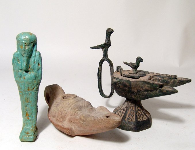 Group of antique tourist pieces in ancient style: A nice group of antique tourist pieces in ancient style, early - mid 20th Century. Lot includes a light blue ushabti of Egyptian style. 4 3/4" (12.1 cm); a ceramic lamp in Roman Egyptian style, the bo