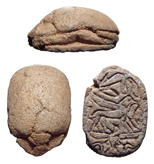 An Egyptian 2nd Intermediate steatite scarab: An Egyptian 2nd Intermediate steatite scarab, c. 1750 - 1570 BC, with a griffin standing to rt., a bird above and another bird with outstretched wings below. Style more Near Eastern than Egyptian. 27 