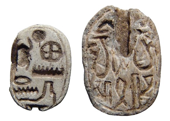 Lot of 2 Egyptian steatite scarabs: Lot of 2 Egyptian steatite scarabs. The first is a Ramesside type, c. 1279 - 1075 BC, and nicely carved, 16 x 11mm, the second is a 2nd Intermediate type, c. 1750 - 1570 BC, with symmetric signs on th