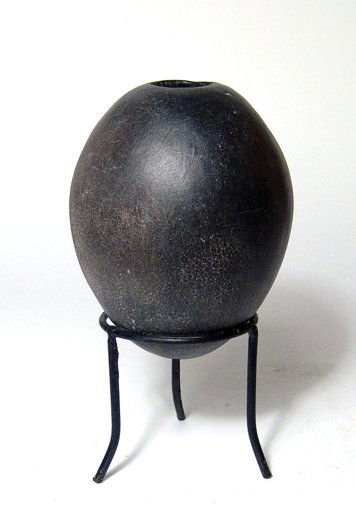 Nice Predynastic black-ware cosmetic jar: A nice Predynastic black-ware cosmetic jar, Naqada II, c. 3650 - 3300 BC, perfectly crafted to fit comfortably in the hand, the body smooth and ovoid with a near pointed base, the shoulders quite stee