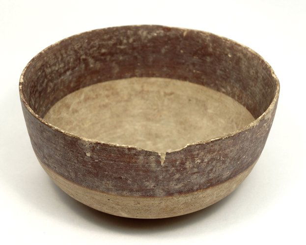 Cypriot Iron Age White Painted-Ware Bowl: A Cypriot Iron Age White Painted-Ware Small Bowl, c. 1050 - 600 BC, of thin construction with near vertical walls and flattened base, a purple-brown band around both sides of the rim. H: 2" (5 cm), D: