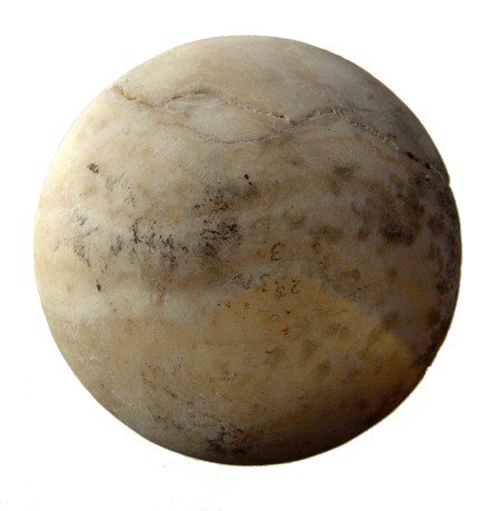 An alabaster lid to a cosmetic jar: An alabaster lid to a cosmetic jar, New Kingdom, c. 1570 - 1075 BC, nicely carved and semi-translucent. Dia: 2 3/4" (6.9 cm). Ex Dr. Gilles collection, Germany, acquired prior to 1970.
