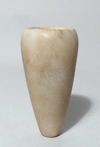 Early dynastic alabaster cosmetic jar ex Lord Kitchener: An Egyptian early dynastic alabaster cosmetic jar, c. 3000 - 2800 BC, the body tapered with flattened base, the mouth slightly rounded with flattened rim. H: 3 5/8" (9.2 cm). Minor chipping on rim, li
