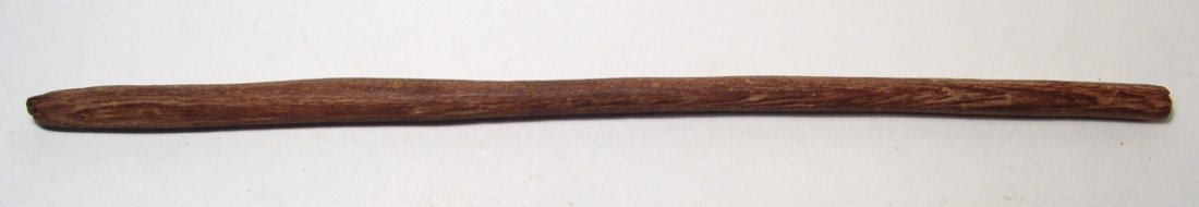 An Egyptian wooden staff: An Egyptian wooden staff, likely a staff from a statue, c. 1st Millennium BC. L: 16" (40.6 cm). Very Rare. Ex English Private Collection.