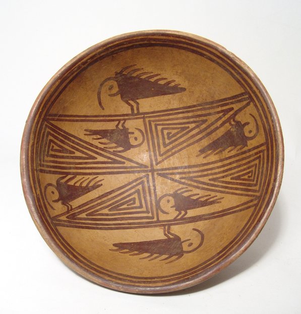 A Narino pedestal bowl, Tuza cultural complex: A Narino pedestal bowl, Tuza cultural complex of Colombia, c. AD 1250 - 1500, the interior nicely decorated with stylized birds and geometric devices. H: 3 3/8" (8.6 cm), H: 7 1/4" (18.4cm). Intact, m