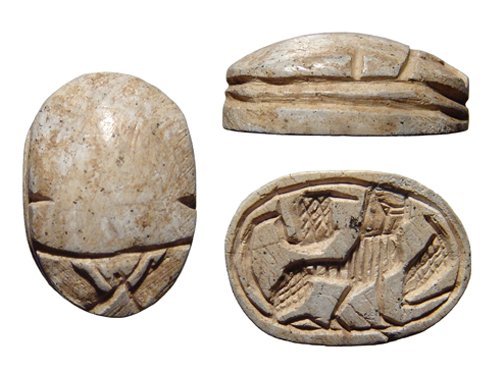 Egyptian steatite scarab, Ex Royal Athena: An Egyptian 2nd Intermediate steatite scarab, c. 1750 - 1570 BC, with a sphinx before erect cobra. 20 x 15mm. Cf. Petrie Buttons, no. 878 var.; Ex Royal Athena Galleries, New York.